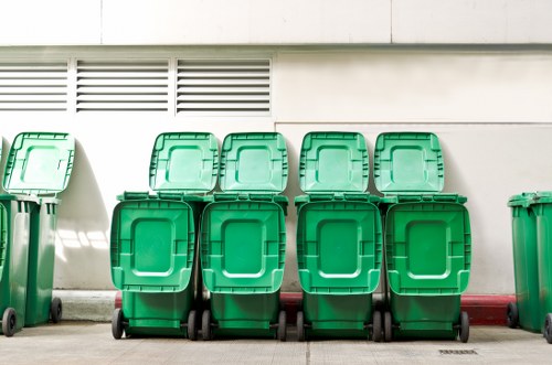 Professional waste removal team handling office waste